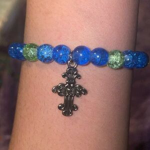 Blue and green acrylic beads bracelet. With cross charm.
